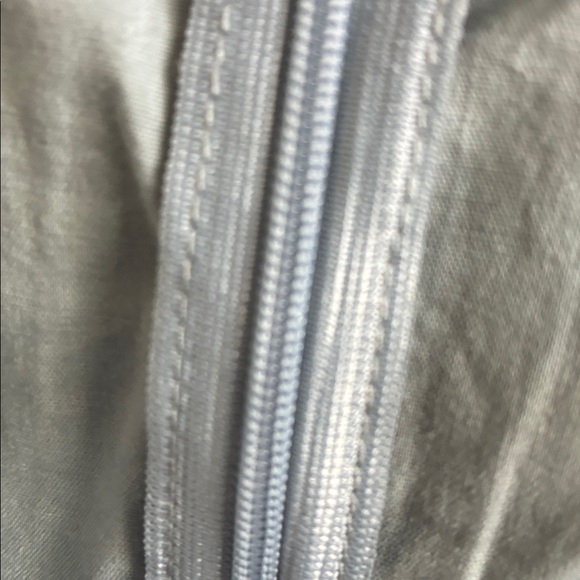 Elegant Silver Zippered Garment - Picture 7 of 7